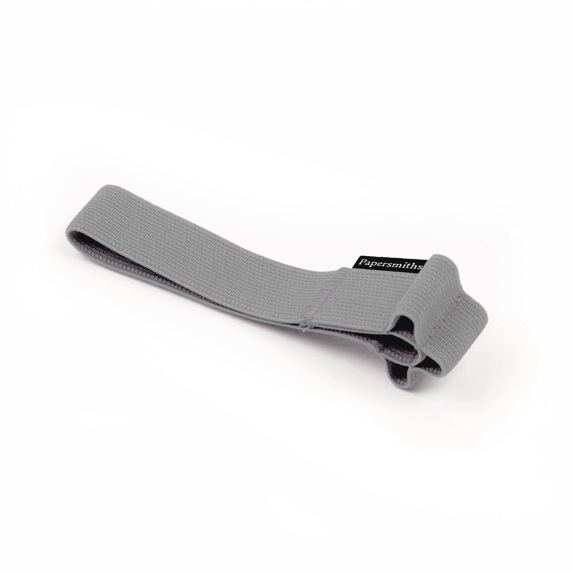 A grey elastic notebook band with a loop end, designed to wrap around a notebook or diary to hold pens and keep pages together.