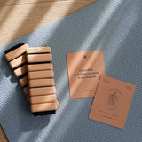 Chakra affirmations on a yoga mat