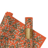red wrapping paper mistletoe design