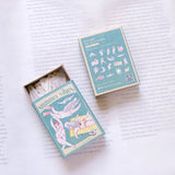 illustrated stickers in a matchbox