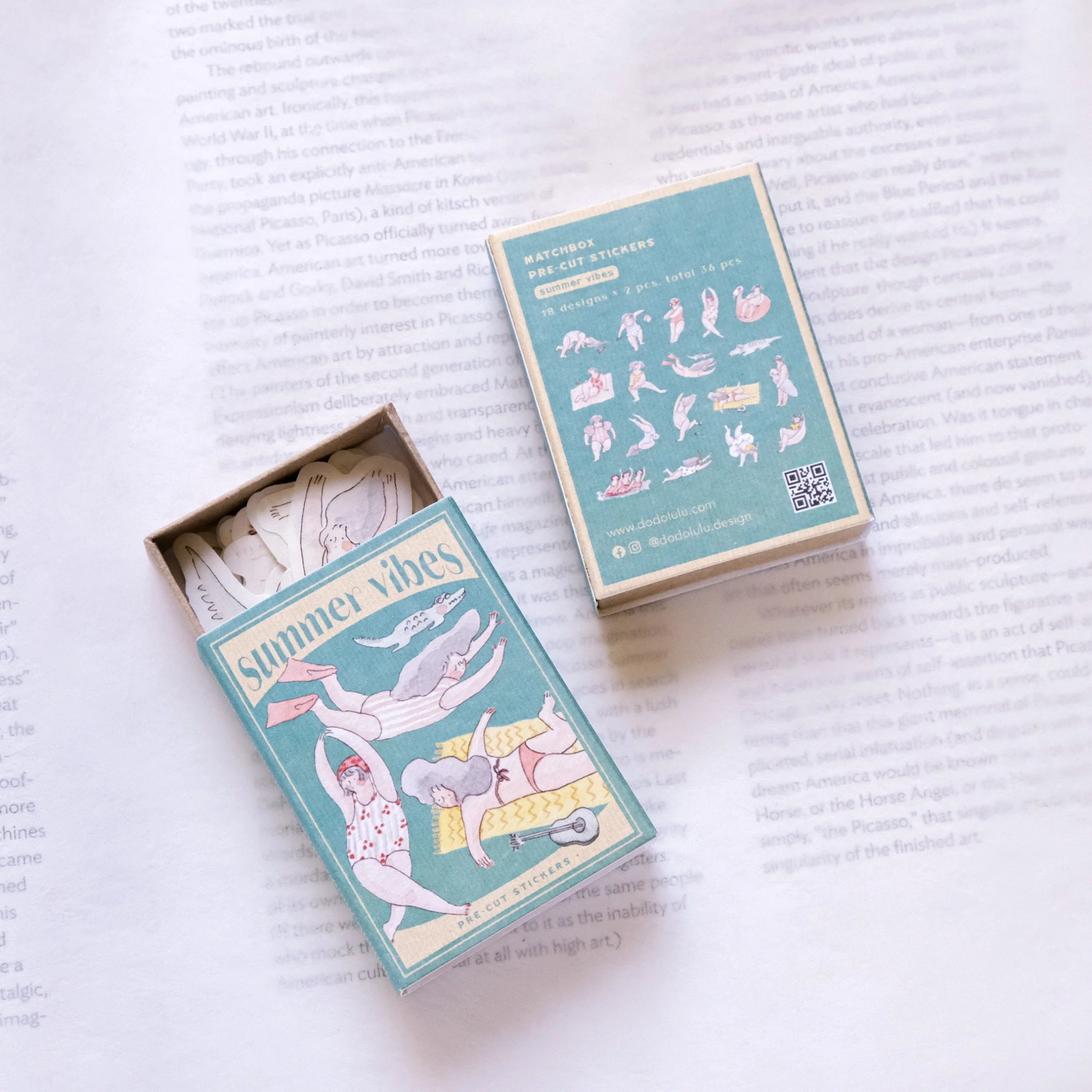 illustrated stickers in a matchbox