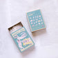 illustrated stickers in a matchbox