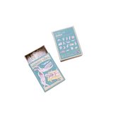 Summer stickers in a matchbox