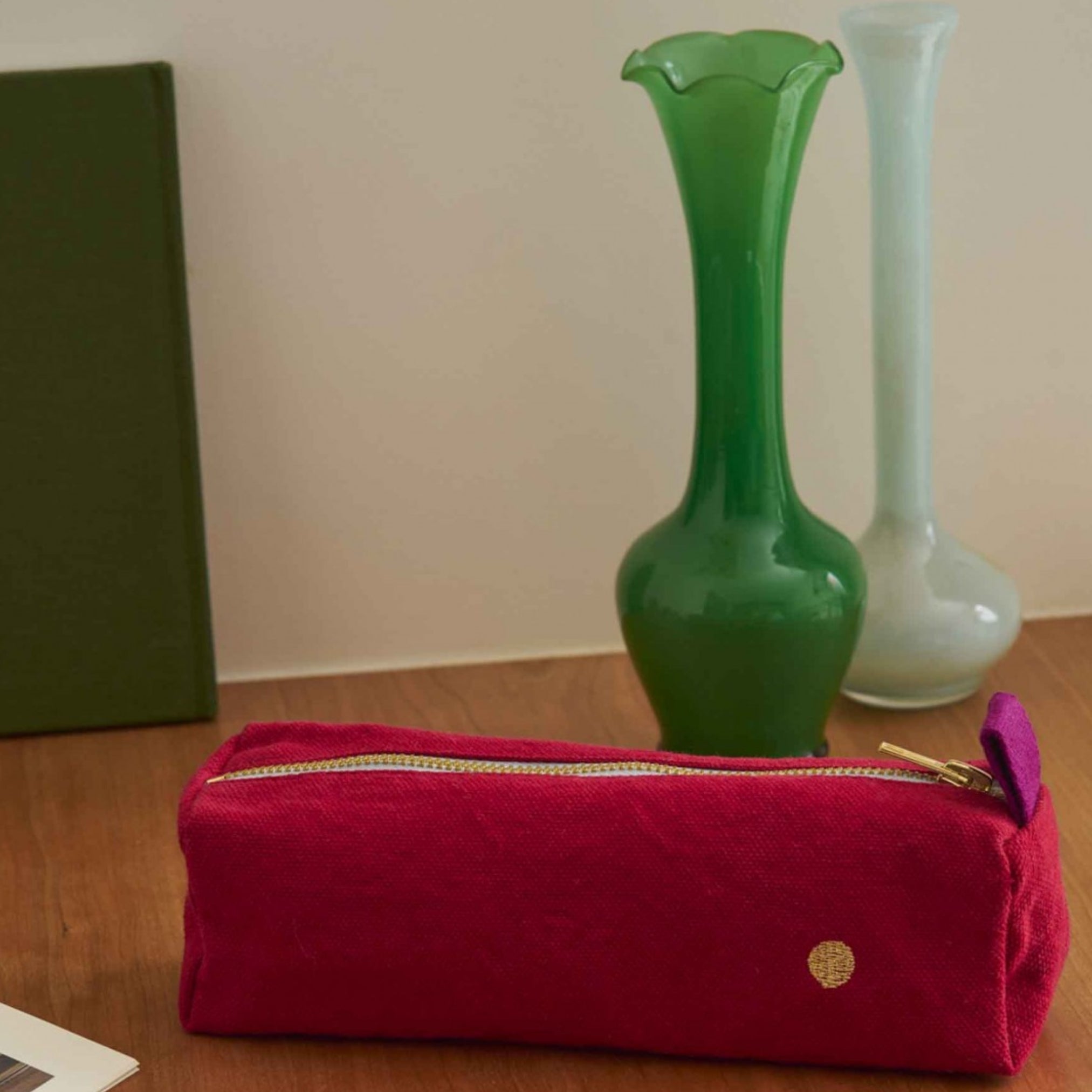 Red Pencil Case That is Waterproof with zipper.