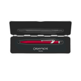 red caran dache pen in metal case