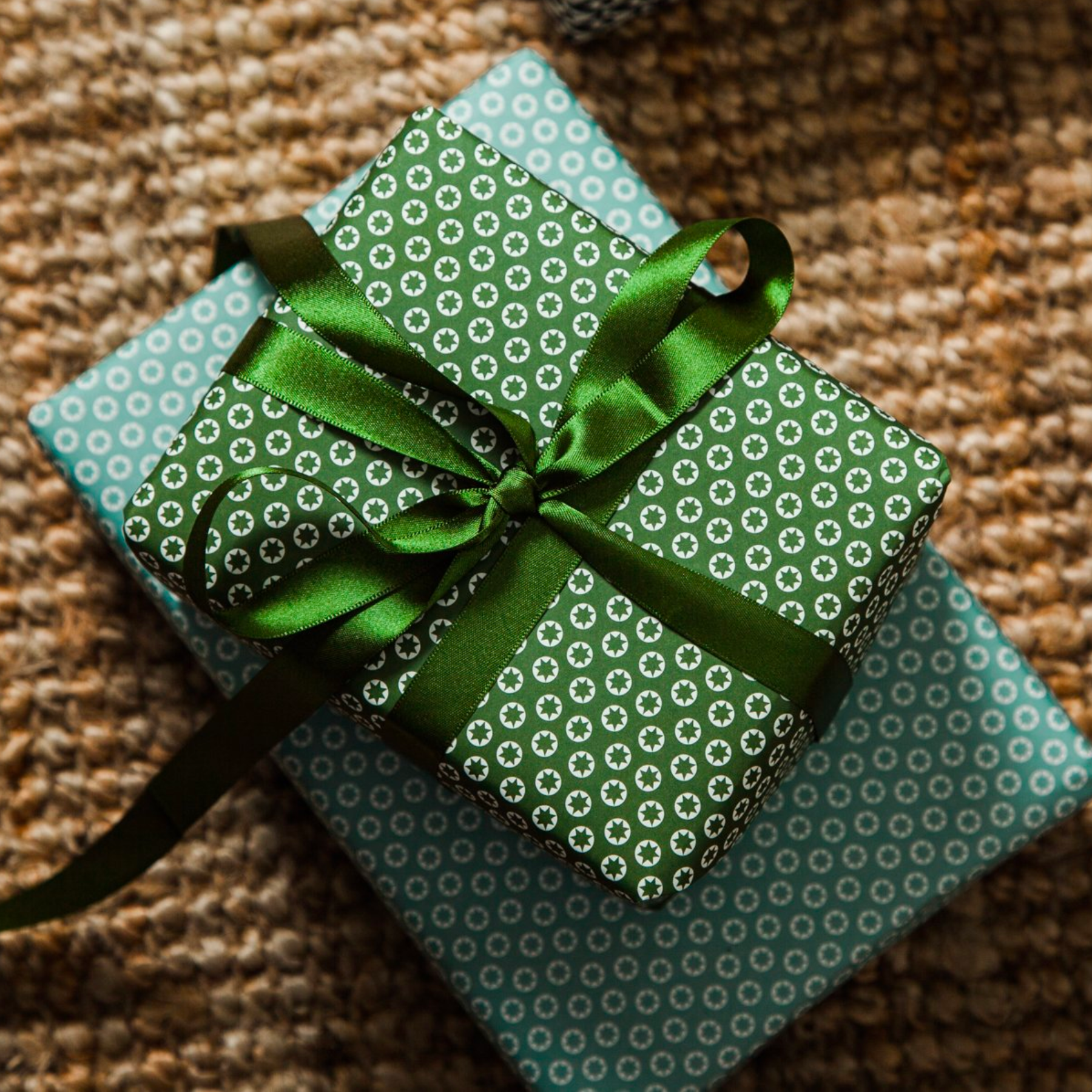 Olive green recycled plastic ribbon tied on present
