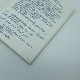 Writing in notebook